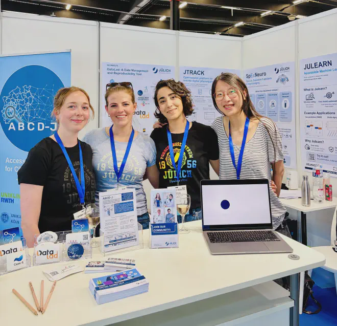 ABCD-J and Forschungszentrum Jülich researchers present the ABCD-J platform in an exhibition booth